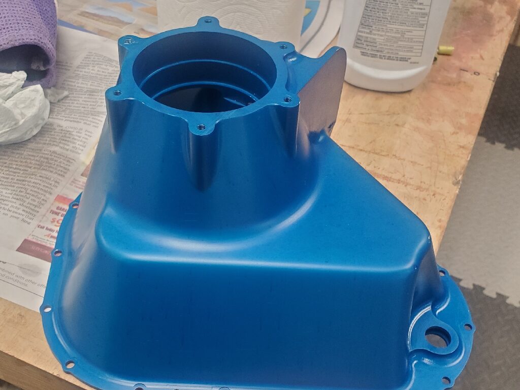 A blue plastic container sitting on top of a table.